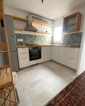 Ático con vistas al mar y a Montjuic