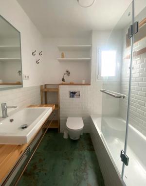 Ático con vistas al mar y a Montjuic