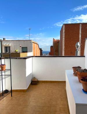 Ático con vistas al mar y a Montjuic